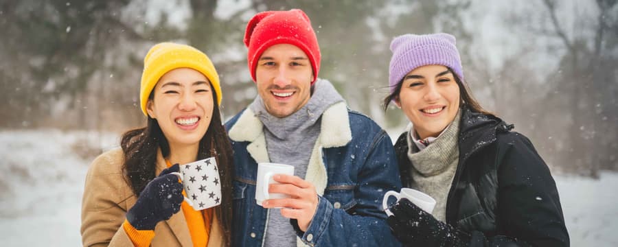group of people staying warm in colder weather